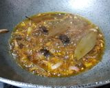 A picture of step 2 of Crab malai curry.
