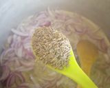 A picture of step 1 of Carrots and potatoe rice.