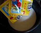Foto langkah ke 3 dari resep Rainbow Bread Pudding.