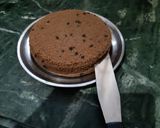 A picture of step 10 of Butterscotch rajbhog ice-cream chocolate cake.