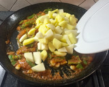 Foto del paso 9 de la receta: Patatas con langostinos y calamares