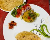 A picture of step 3 of Masoor Dal Bharta with North Indian Style Chapati and Chatpata Mango Pickle.