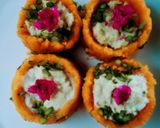A picture of step 4 of Ladoo cups with Rabri filling busicuits crums.