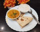 A picture of step 7 of Arbi Masala Curry in curd.