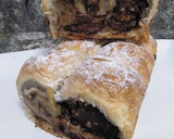Foto del paso 8 de la receta: Rollitos de hojaldre rellenos de nutella y nueces