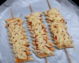 A picture of step 2 of Penne pasta pizza sticks.
