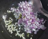 A picture of step 2 of Pink cheese pasta with garlic bread.