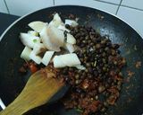 A picture of step 6 of Chana aalu masala.