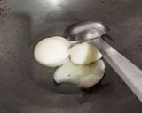 A picture of step 2 of Aata Suji ladoo.