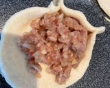 A picture of step 6 of Lebanese homemade meat pies/ Lahm bi Ajeen or Sfiha.