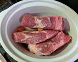 A picture of step 4 of Tangy Crock-Pot Pork.