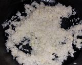 Foto del paso 3 de la receta: Arroz blanco salteado en mantequilla al ajillo