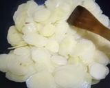 A picture of step 1 of Fry aloo.