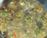 A picture of step 2 of Spinach and Tomatoes fritters.