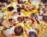 Foto del paso 3 de la receta: Pizza de ibéricos con higos frescos