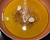 A picture of step 1 of Fried potatoes - garlic, rosemary, thyme.