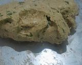 A picture of step 4 of Multigrain Atta Brinjal & Curd Thalipith.