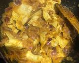 A picture of step 4 of Rajasthani Papad Pyaz in gravy.