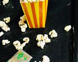 A picture of step 2 of Popcorns tossed with Maggi masala seasoning.