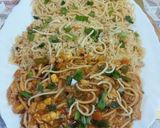 A picture of step 9 of American chopsuey with fried rice.
