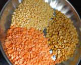 A picture of step 1 of Arhar Moong Masoor Dal Tadka.
