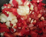 Foto del paso 9 de la receta: Chocos en salsa, brochetas de langostinos al whisky y coquinas al ajillo