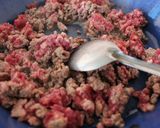A picture of step 11 of Red Enchiladas with Vegetable Picadillo.