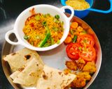 A picture of step 5 of Sev tamatar nu shaak (Gujarati dinner sabji with phulka).