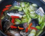 Foto langkah ke 7 dari resep Garang Asem Ikan Mas.