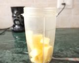 A picture of step 1 of Mango & lemon punch.