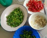 A picture of step 1 of Turmeric rice and beans.