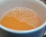 A picture of step 2 of Cream Custard shots with orange sauce.