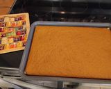 A picture of step 10 of Classic Pumpkin Roll.