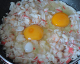 Foto del paso 4 de la receta: Piquillos rellenos de gambas y surimi