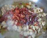Foto del paso 3 de la receta: Arroz meloso de pollo, chorizo y jamón