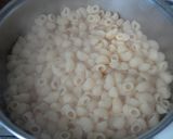 Foto del paso 3 de la receta: Macarrones con butifarra y salsa de tomate con vermut y chocolate