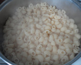 Foto del paso 3 de la receta: Macarrones con butifarra y salsa de tomate con vermut y chocolate