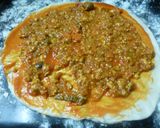 Foto del paso 5 de la receta: Pizza con picadillo, salsa barbacoa y huevo frito