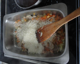 Foto del paso 4 de la receta: Arroz al horno con huevos estrellados