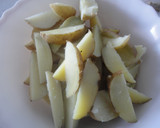 Foto del paso 2 de la receta: Gajos de patata con orégano y pimentón