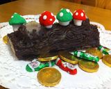 Foto del paso 3 de la receta: Tronco navideño con mazapán y chocolate relleno de turrón