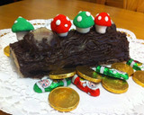 Foto del paso 3 de la receta: Tronco navideño con mazapán y chocolate relleno de turrón
