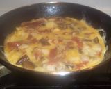 Foto del paso 7 de la receta: Tortilla de jamón serrano, setas y queso