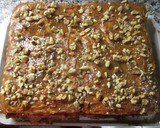 Foto del paso 3 de la receta: Súper tarta de hojaldre con dulce de leche, nueces y duraznos