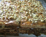 Foto del paso 4 de la receta: Súper tarta de hojaldre con dulce de leche, nueces y duraznos