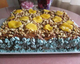 Foto del paso 5 de la receta: Súper tarta de hojaldre con dulce de leche, nueces y duraznos