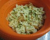 A picture of step 1 of Garlic Pork Chops with Mixed Buttered Pasta.