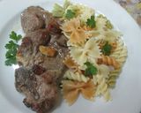 A picture of step 5 of Garlic Pork Chops with Mixed Buttered Pasta.