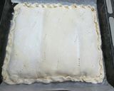 Foto del paso 4 de la receta: Tarta de jamón, queso y aceitunas