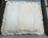 Foto del paso 4 de la receta: Tarta de jamón, queso y aceitunas